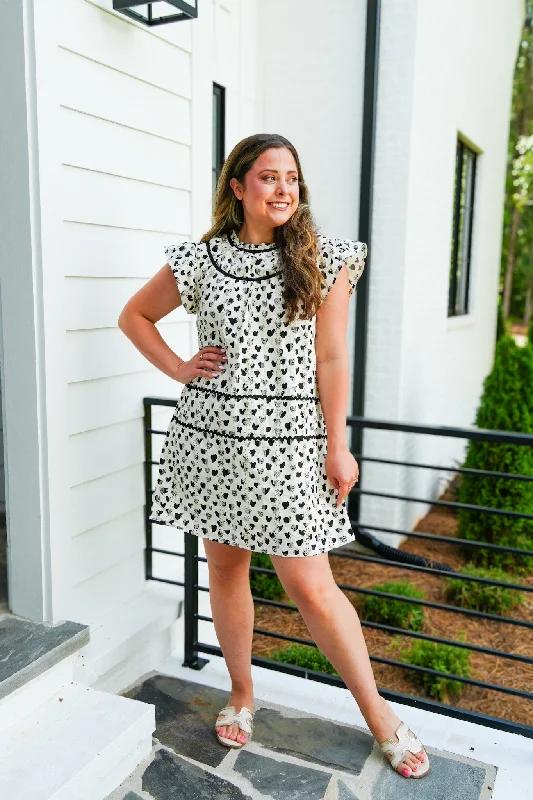 Iconic women’s outfits that never go out of style   Printed Eyelet Shift Dress